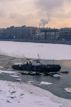 Old ship makes its way through the iceの写真素材