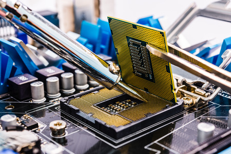 Repair of the computer with two toolsの写真素材