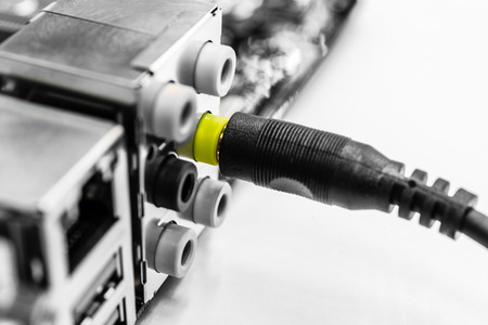 Plug jack into connectorの写真素材