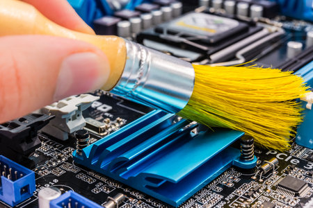 Cleaning of the computer with brushの写真素材