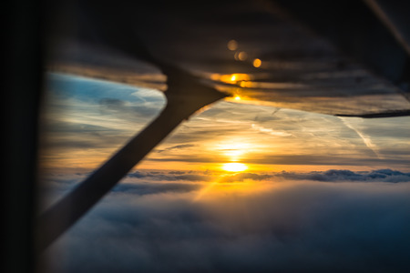 Sunset from the planeの写真素材
