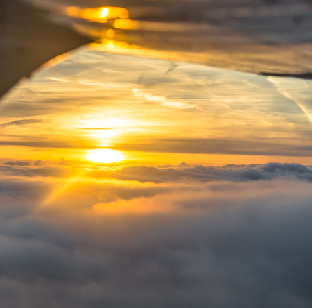 Sunset from the planeの写真素材