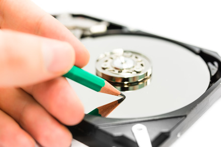 Writing the data on hard disc driveの写真素材