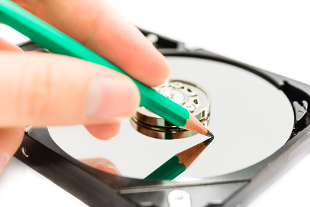 Writing the data on hard disc driveの写真素材