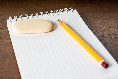 Pencil and eraser on the tableの写真素材