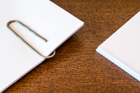 Paper clip on the wooden tableの写真素材