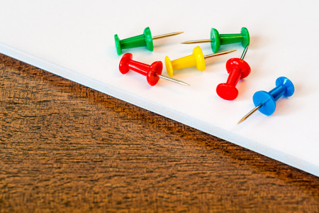 Color tacks on the paperの写真素材