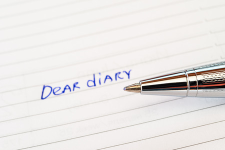 Diary and a penの写真素材