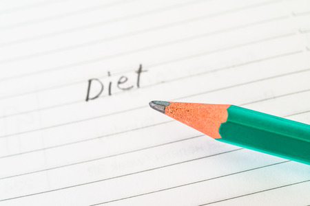 Diet sign in the notebook by pencilの写真素材