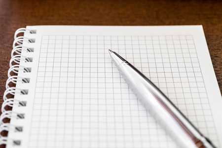 Empty notebook with a penの写真素材