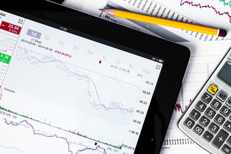 Work in stock exchange, calculate of incomeの写真素材