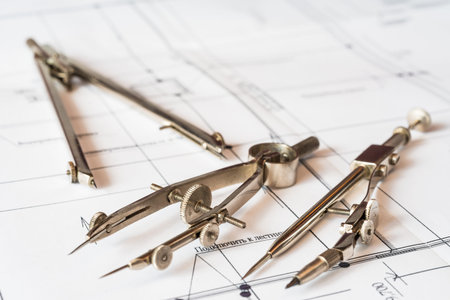 Diagrams and drawing tools on the table. Angle view