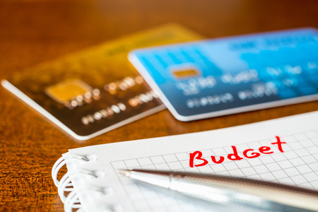 Cash budget, the calculation of the balance, a credit cards on the tableの写真素材