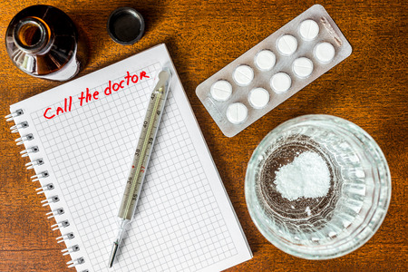 Call the doctor couple of tablets dissolved at a temperature of the glass of water. Focus on the glass of waterの写真素材