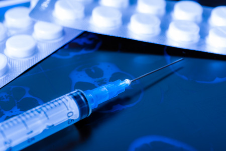 Xray examination syringe for injection tablets for treatment of disease. In blue tonesの写真素材