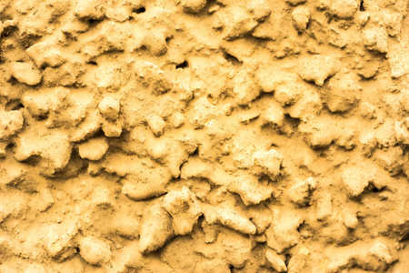 Stone wall. In yellow tonesの写真素材