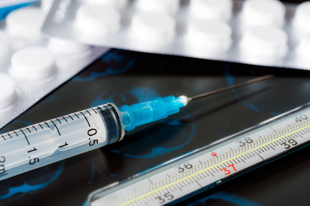 X-ray examination, syringe for injection, tablets for treatment of disease and thermometerの写真素材