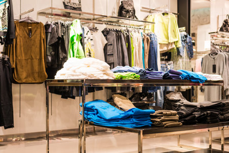 In a clothing store, shelves with goodsの写真素材