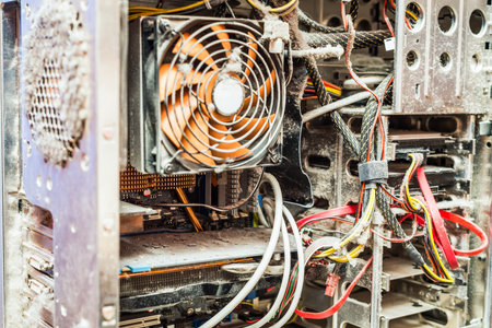 The main components of the outdated, dusty and non-working computerの写真素材