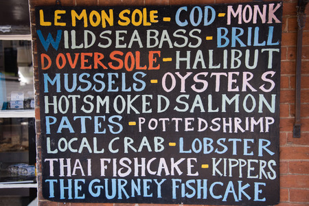 Colourful sign for shop selling local fish and shellfishのeditorial素材