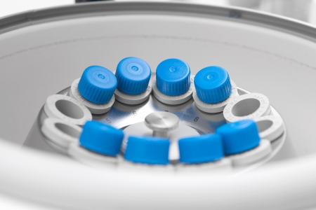 Vortex mixer in bio lab closeup under studio lightsの写真素材