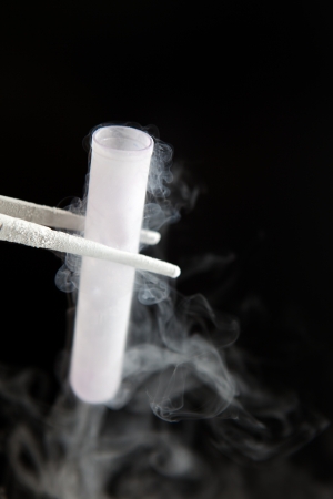 Tube with liquid nitrogen in bio lab under studio lightsの写真素材