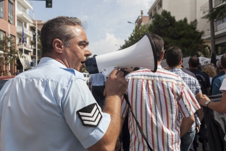ALEXANDROUPOLIS, GREECE - SEPT 26: Protesters in city streets during protest rally against the greek government's new economic measures on September 26, 2012 in Alexandroupolis, Greece.のeditorial素材