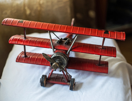 red old aeroplane miniatureの写真素材
