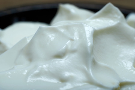 Closeup view of yogurt in a bowl.の写真素材