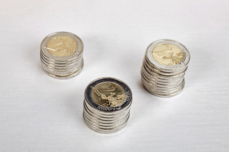 Euro coins stacks close up.