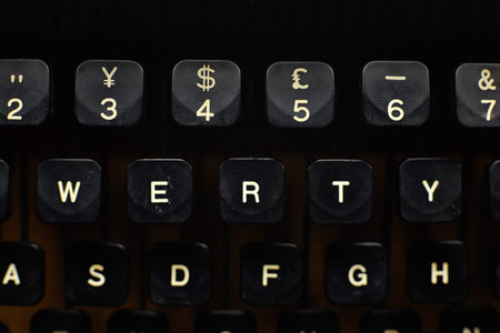 Detail of a black vintage typewriter close up on keys.