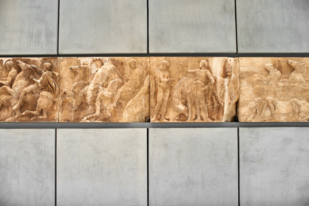 ATHENS, GREECE - DECEMBER 30, 2016: Section of west frieze from the Elgin Marbles of Parthenon in the Acropolis museum.のeditorial素材