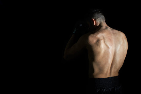 Closeup of an athletic boxer body.