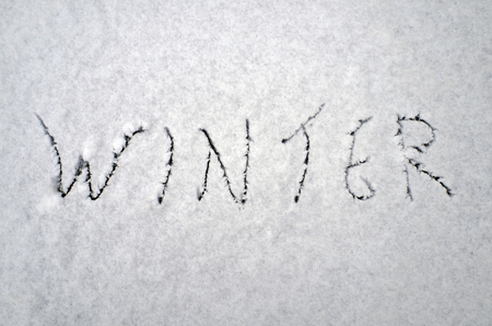 The word "winter" on the snow.の写真素材