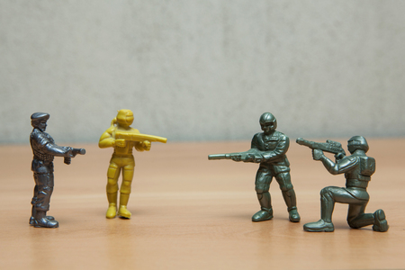 Soldiers games toys on wooden floor.の写真素材