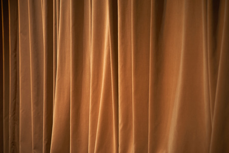 Brown curtains of a theater as background.の写真素材