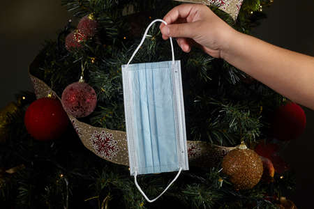 Christmas snowman ornament on lights background.の写真素材