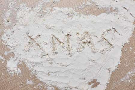 Christmas snowman ornament on lights background.の写真素材