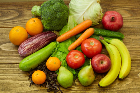 vegetables and fruits on wooden table. healthy diet.の写真素材