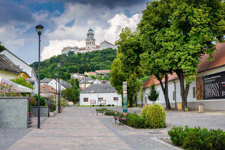 Pannonhalma, Hungary - July 23, 2016: Pannonhalma city center and main square with the Archabbey in...