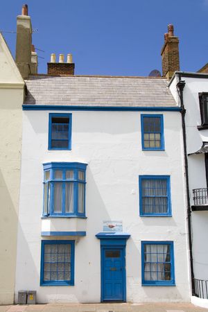 Blue and white seaside propertyの写真素材