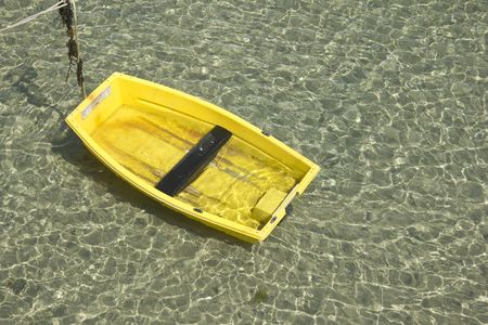 Yellow boat, green seaの写真素材