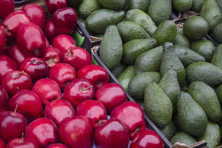 Apples and avocadosの写真素材