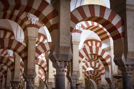 Red and white arches in mosque-cathedral of Cordoba in Andalusiaのeditorial素材