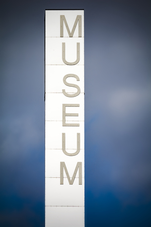 Tall museum sign outside cultural centre in Scandinaviaの写真素材