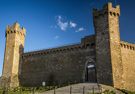 Montalcino castle in evening sunshine in Tuscanyのeditorial素材