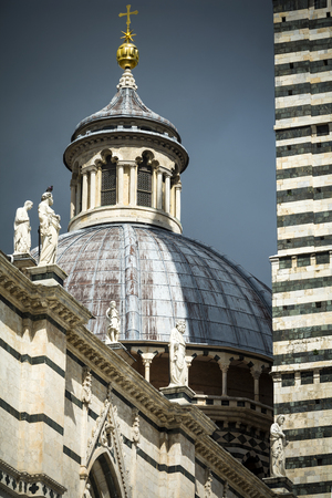 Siena cathedral dome in sunshine in Tuscanyの写真素材