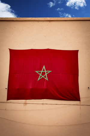 Morocco flag on high wall in Marrakeshの写真素材