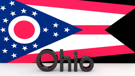 Writing with the name of the US state Ohio made of dark metal  in front of state flagの写真素材