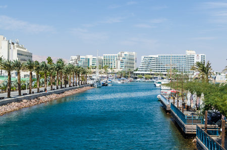 EILAT, ISRAEL - November 7, 2017: entrance to the marina, with promenades, modern hotel complexes,...